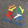 A 10L cooler bag featuring a grey fabric design and a colourful arrow logo, along with branding.