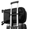 A black backpack attached to a wheeled suitcase, featuring straps for secure fastening and a sleek design.