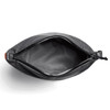 A grey cooler bag with a zippered opening, showcasing the interior lining and a branding logo.
