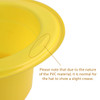 A yellow PVC top hat with a glossy finish, featuring a slight crease at the edge. It has a logo on the surface.
