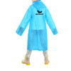 A blue reusable raincoat for kids with a hood and a logo on the back, worn over casual attire.