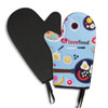 A neoprene oven mitt featuring a colourful food pattern on one side and a black textured surface on the other.