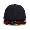 A custom flat peak cap featuring a dark navy body and a floral-patterned peak in vibrant colours. It has a logo.
