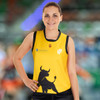 A woman in a yellow sleeveless sports jersey featuring a bull graphic and a logo.