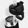 A drink bottle in black with a flip straw and stainless steel interior, featuring a lid with a logo.