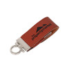 A brown leather keychain with a metal clip and a logo on the strap.