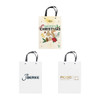A knitted handle bag with lamination in cream and white, featuring festive and plain designs, including logos.