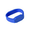 A blue silicone watch flash drive with a smooth surface and compact design, featuring branding.