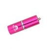 A pink lip balm-shaped flash drive with a metal finish and a logo on its side.