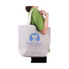 A large, washable grey kraft paper bag with a cotton handle, featuring a logo on the front.
