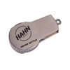 A silver flash drive with a circular design, featuring a logo and a leather-like texture along the edge.