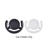 A black and a white phone pop holder car clip, featuring a circular centre and curved grips for attachment.