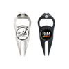 A golf divot tool with a ball marker and bottle opener, featuring silver and black designs and logos.