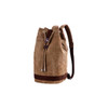 A brown canvas bucket backpack with a drawstring closure and leather accents. It features adjustable straps.