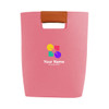 A pink felt tote bag with a tan handle and a multicoloured logo on the front.
