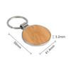 A round wooden keyring with a silver metal attachment, featuring a natural wood finish. Measurements are included.