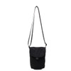 A small black canvas shoulder bag with a long strap and a flap closure. It features a branded logo.
