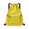 A yellow multi-pocket drawstring backpack with a front zip pocket and black straps. It has a logo on it.