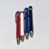 Four ball pens in red, white, blue, and black, featuring a textured grip and clip, with a logo on each.