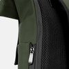 A close-up of a green soft-touch flap backpack, featuring a zipper and mesh side panel.
