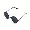 Retro round sunglasses with a black frame and dark lenses. Features sleek, minimalist design.