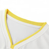 A close-up of a white sport jersey featuring a curved V-neck with a yellow trim and a logo.