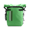 A waterproof roll top backpack in a vibrant green colour, featuring adjustable straps and a reflective strip.