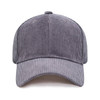 A grey corduroy baseball cap featuring a structured crown and a curved brim. It has a logo on the front.
