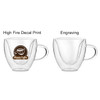 A double wall mug featuring a clear glass design with a handle, showcasing a logo on one side.
