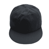 A giant black baseball cap with a flat brim and a structured crown. It features a logo on the front.