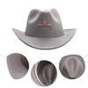 A classic felt fedora cowboy hat in grey, featuring a decorative logo. The hat has a wide brim and a rounded crown.