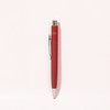 A red metal pen featuring a sleek design and a clip, with a logo on its barrel.
