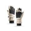 Ski gloves in beige and black, featuring a textured grip and elastic wrist for a snug fit. The gloves have a logo.