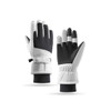 Ski gloves in white and black, featuring a textured grip and adjustable wrist straps. Branding present on the gloves.