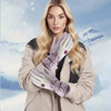 Ski gloves in light purple with a logo, worn by a model against a snowy background.