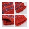Fingerless gloves in red with blue and white jacquard patterns, featuring a logo on the cuff.