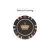 A black and beige poker chip featuring a crown design. It has a circular shape and a decorative edge.