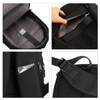 A black expandable laptop backpack features multiple compartments, including a spacious main pocket and side pockets.