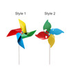 A colourful pinwheel featuring red, blue, yellow, and green blades, mounted on a white stick.