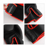Kids boxing gloves in black with red accents, featuring padded protection and adjustable Velcro straps.