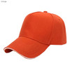An orange heavy cotton sandwich cap featuring a logo and a structured five-panel design.