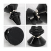 A black rotatable clip-on car phone holder with a sleek design and a metallic accent. It features a strong grip base.