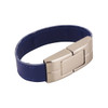 A blue leather bracelet with a silver clasp, featuring a logo and designed as a flash drive.