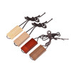 Four wooden string flash drives in light wood, dark wood, and red wood, each with a tied string.