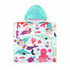 A vibrant kids' hooded change towel featuring mermaids, narwhals, and sea creatures in shades of turquoise and pink.