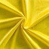 A bright yellow fabric featuring a smooth, shiny surface, suitable for sports uniforms and bibs.