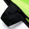 A green polyester training bib featuring a black strap and a logo.