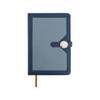 A navy blue pocket notebook with a magnetic buckle closure and a decorative circular element on the front.
