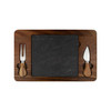 A wooden cheeseboard with a square slate surface, featuring two cheese knives with wooden handles.