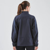 A women's navy jacket with a high collar and elastic cuffs, featuring a logo on the sleeve.
